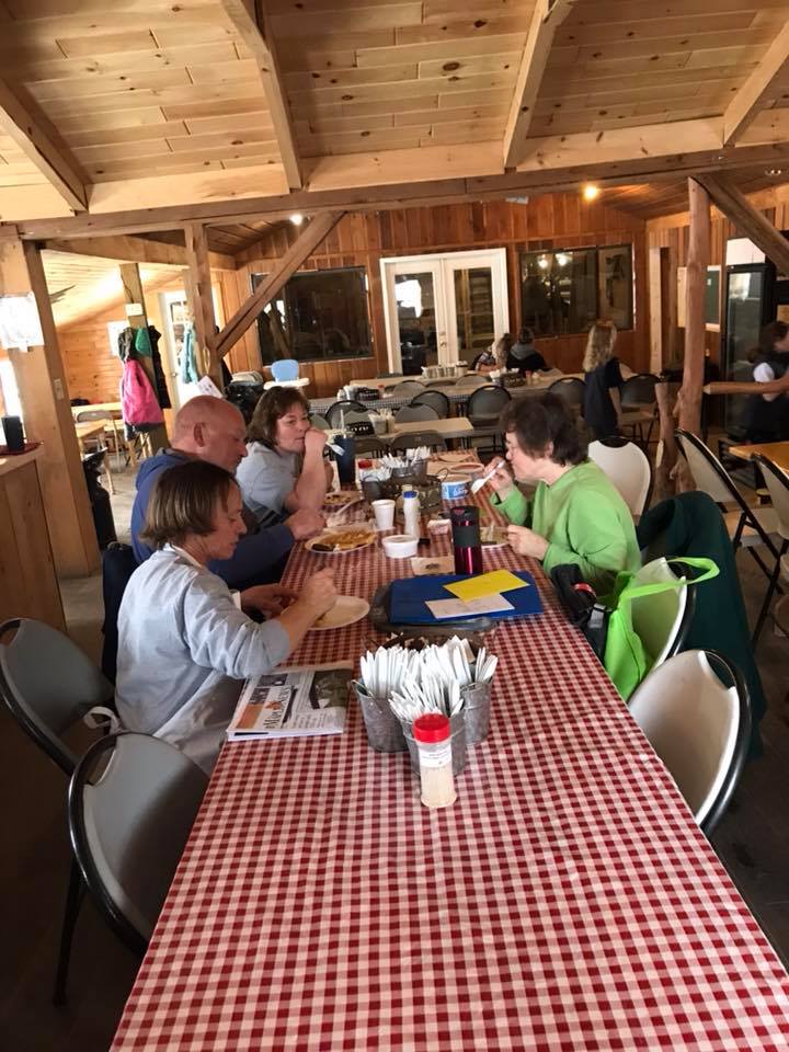 people eating at the pancake breakfast