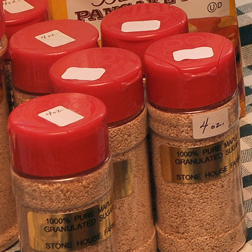 Granulated Maple Sugar in plastic containers